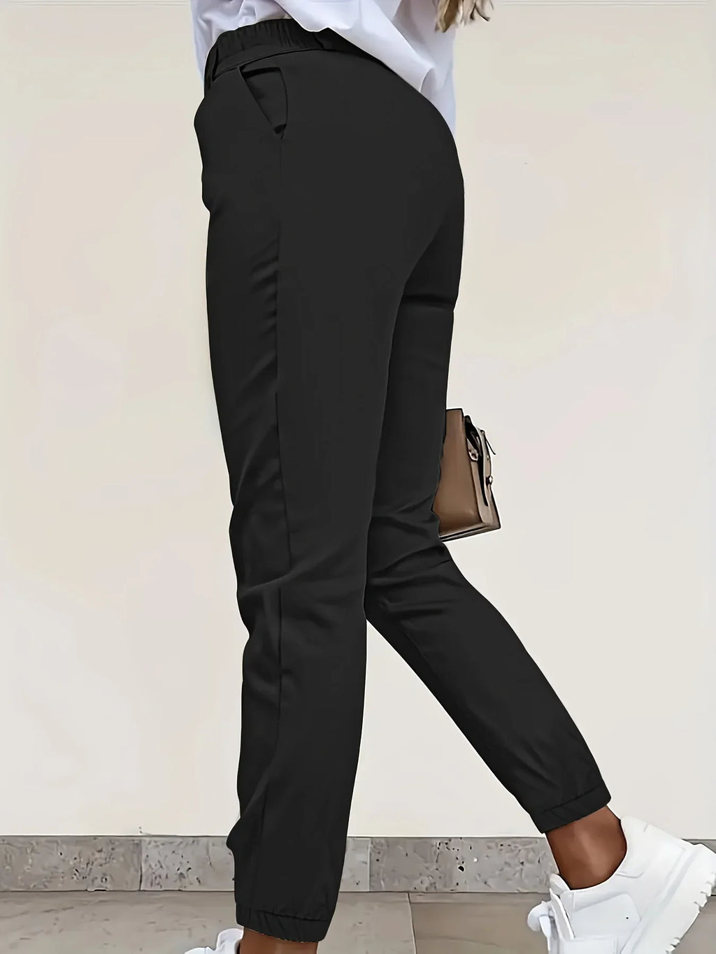Women's black tailored slim-fit trousers